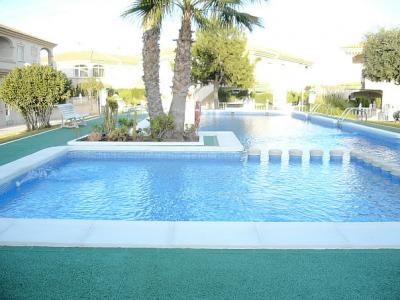 Lovely 2 bed ground floor apartment with stunning pool 15 mins walk sandy beach &amp; near all ameni