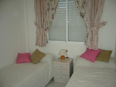 Lovely 2 bed ground floor apartment with stunning pool 15 mins walk sandy beach &amp; near all ameni